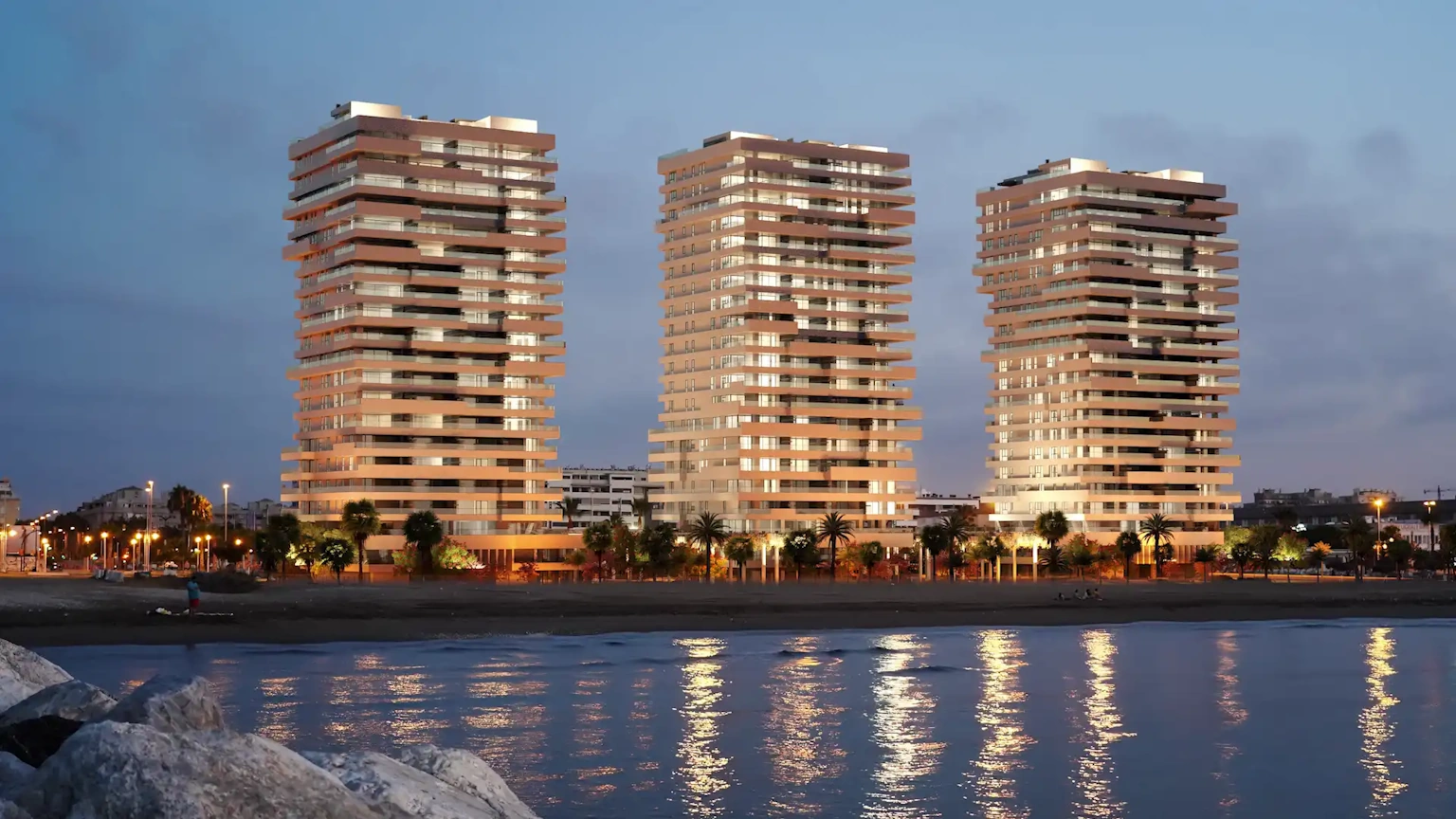 Golden Towers Malaga by night with view from ocean